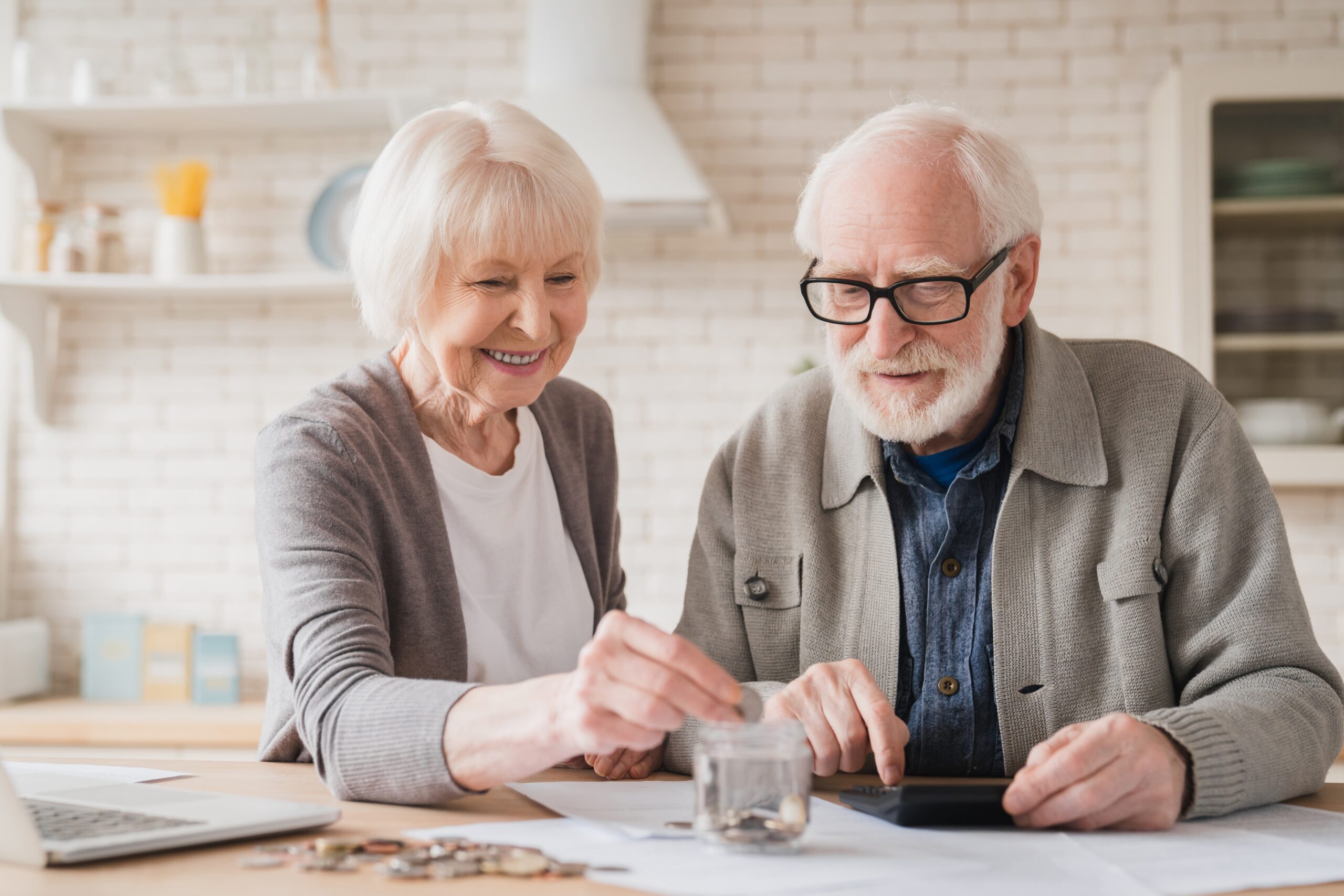 Older couple reviewing savings