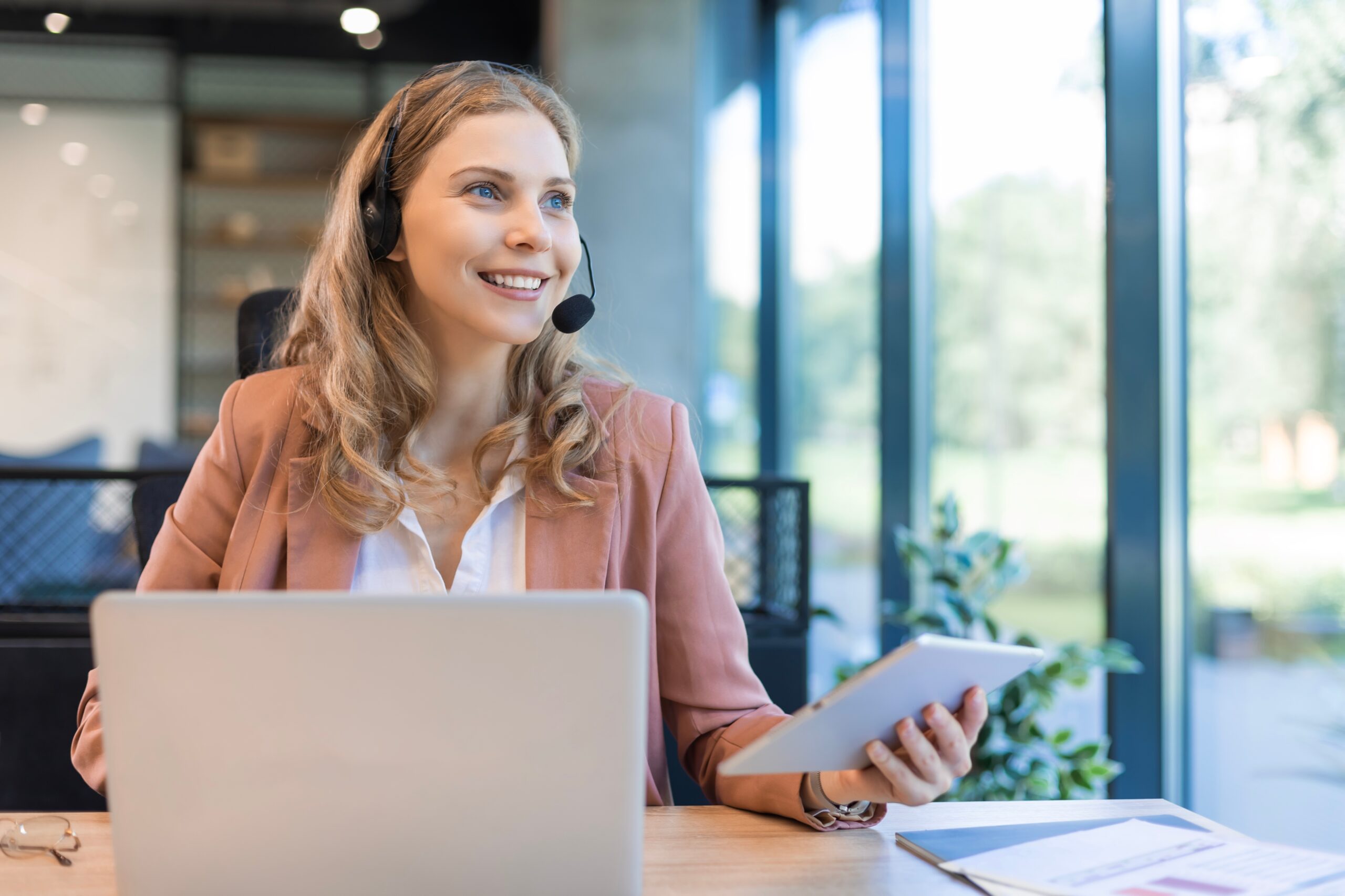 Young call center woman taking a call