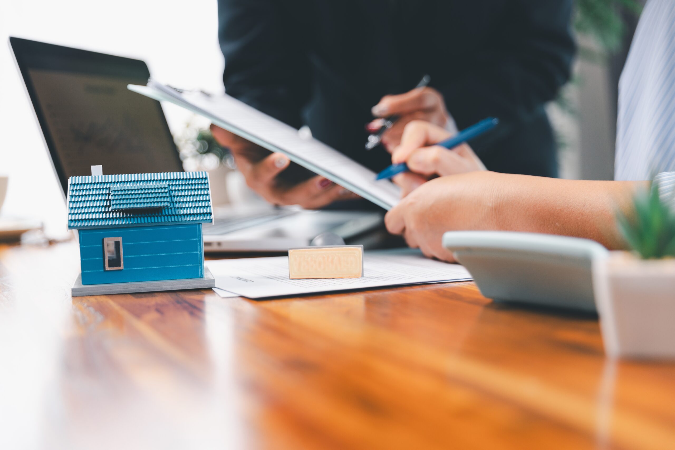 Woman signing document